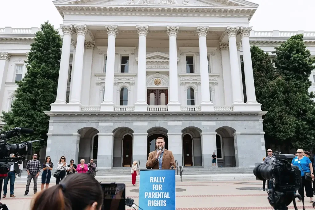 Jonathan R. Keller speaks at the Rally for Parental Rights in front of the California State Capitol