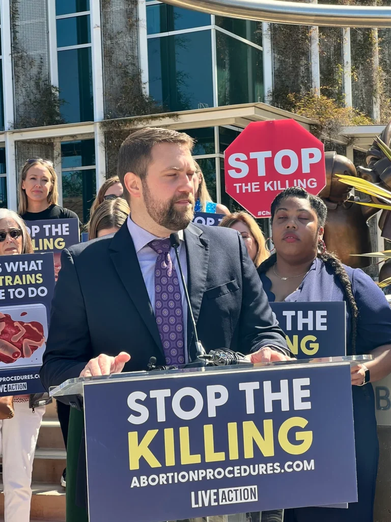 Jonathan Keller speaks at a Stop the Killing press conference in 2022.