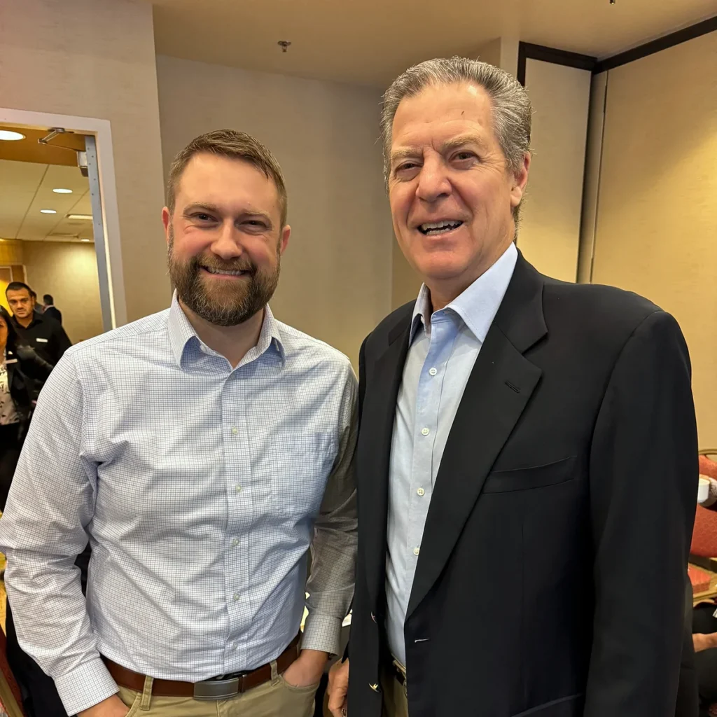 Jonathan Keller with former Ambassador Sam Brownback in 2023.